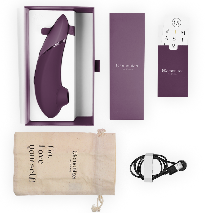 WOMANIZER - NEXT ESTIMULADOR DE CLITORÍS MORADO